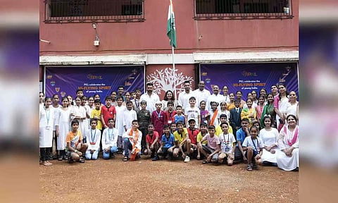 &nbsp;PKL players pose with school children after the flag hoisting ceremony&nbsp;
