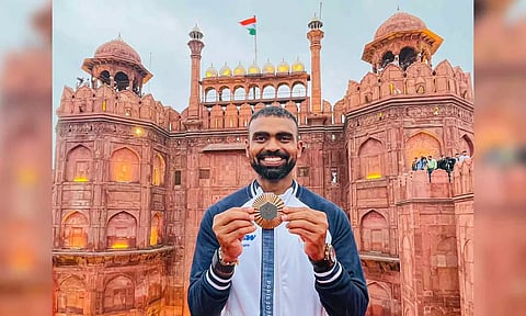 PR Sreejesh poses with the Paris Olympics 2024 medal during the 78th Independence Day celebration at the Red Fort (PTI)