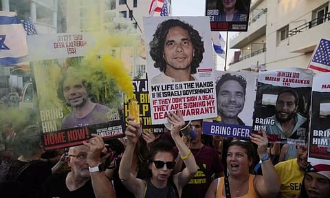Relatives of hostages held by Hamas in the Gaza Strip and their supporters protest (AP)