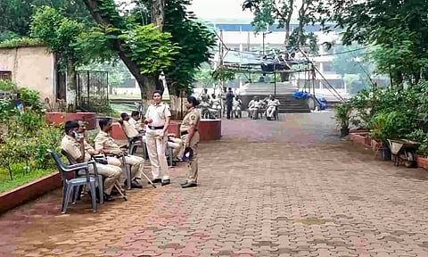 Police personnel deployed at the school in Badlapur a day after massive protests over alleged molestation of two school girls, in Thane (PTI)&nbsp;