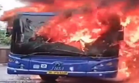 A DTC low-floor bus carrying around 50 passengers was completely gutted after catching fire (Screengrab)