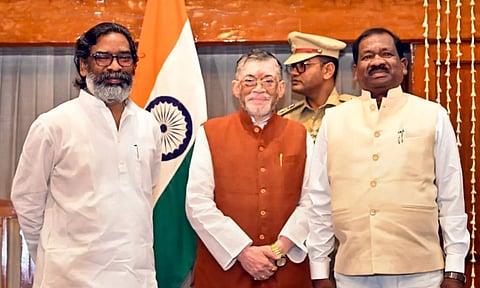 Jharkhand Governor Santosh Gangwar and Chief Minister Hemant Soren with Minister Ramdas Soren (PTI)