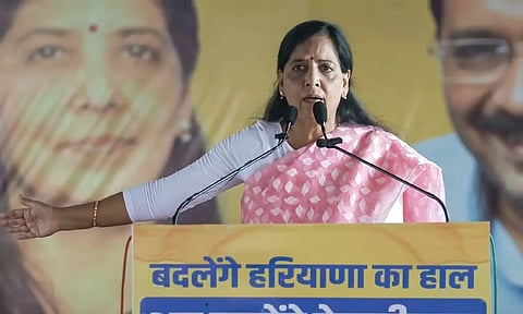 Sunita Kejriwal, wife of Delhi CM and AAP convenor Arvind Kejriwal, speaks during a public meeting ahead of the Haryana Assembly elections (PTI)