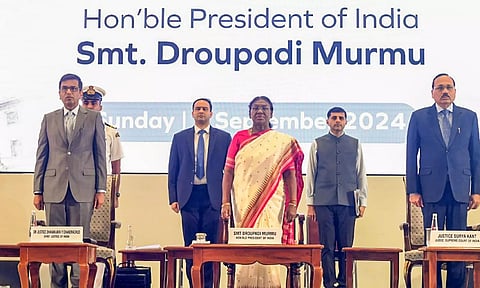 President Droupadi Murmu with Chief Justice of India D.Y. Chandrachud&nbsp; and Supreme Court judge Justice Surya Kant during the closing ceremony of the two-day National Conference of the District Judiciary (PTI)