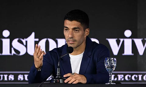 Luis Suarez interacts with the media ahead of World Cup qualifier in Uruguay