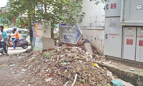 Furniture and construction debris dumped on Singaravelan Nagar road, at Puthagaram near Kolathur