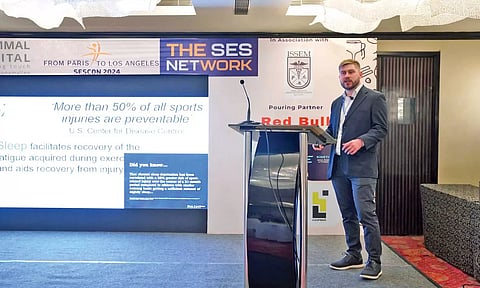 Sam Pullinger delivering his speech at the SESCON 2024 Annual event by the SES Network in Chennai