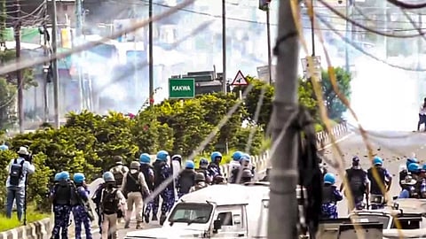Security personnel stand in Imphal district (PTI)