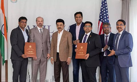 CM Stalin with Caterpillar Inc officials (X)