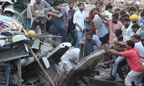 Rescue operation underway on the second day after a house collapsed, in Meerut (PTI)