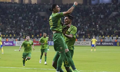 Mohammed Dawood celebrates after scoring a goal (AP)