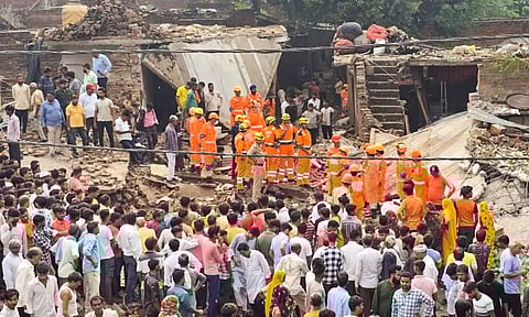 Rescue operation underway after an explosion at a firecracker factory, in Firozabad (PTI)