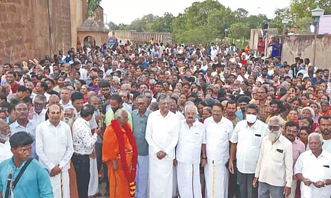 Devotees gather for the Pournami Girivalam at the Big Temple on Tuesday