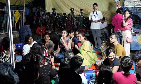 Junior doctors continue their 'dharna' against the RG Kar Hospital rape and murder incident, near Swasthya bhawan in Kolkata (PTI)