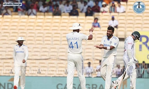 Jasprit Bumrah celebrates with teammates after taking the wicket (Justin George)