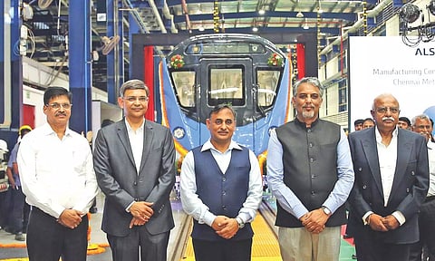 Har Sahay Meena, secretary, Special Initiatives Department, and Alstom officials during transfer of train set to the testing bay