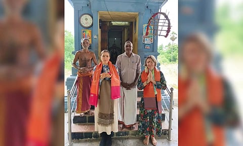 Zhenya from Russia and Elina from Ukraine at Thirumoolar temple in Sathanur in Thanjavur