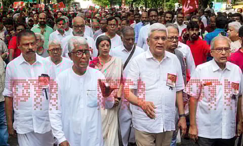 CPI (M) politburo members Prakash Karat, Biman Bose, Brinda Karat, former Tripura chief minister Manik Sarkar and others march during the last journey of late party leader Sitaram Yechury from the party headquarters to the AIIMS hospital (PTI)