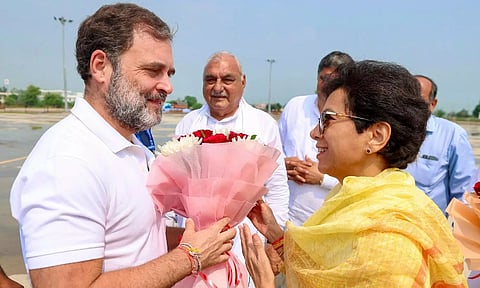 Leader of Oppostion in Lok Sabha and Congress leader Rahul Gandhi with party leader Kumari Selja during a public meeting for Haryana Assembly elections (PTI)