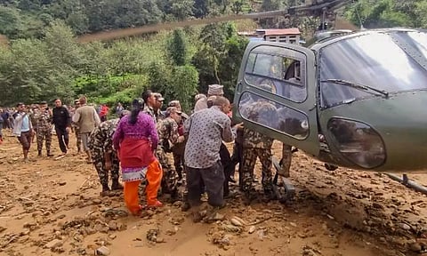 Nepali Army personnel rescue persons from flood and landslide-affected areas of Kavrepalanchok (PTI)
