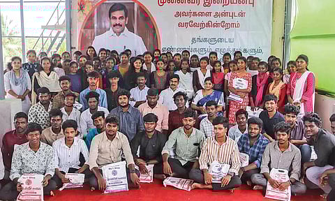 The first-time graduates from Kannagi Nagar with former Chief Secretary Irai Anbu (Photo credit: Hemanathan M)