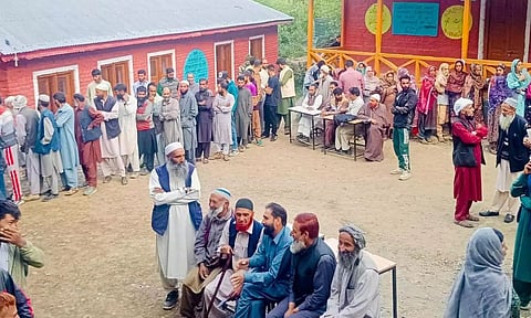 &nbsp;People wait in queues to cast their votes during the third and final phase of Jammu &amp; Kashmir Assembly elections (PTI)
