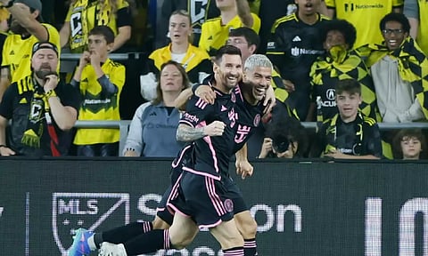 Lionel Messi and Luis Suarez celebrate goal against the Columbus Crew during an MLS soccer match in Columbus (Credit: AP)