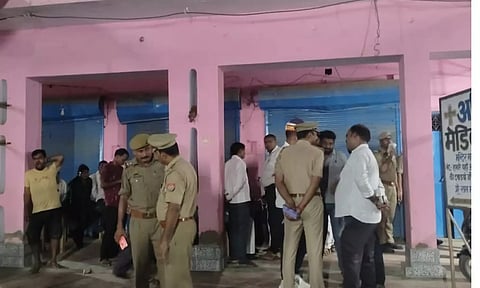 Police personnel investigate after four members of a family were shot dead at their home, in Amethi, Uttar Pradesh (PTI)