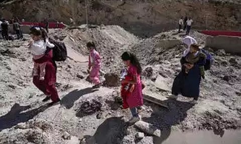 People cross into Syria on foot, through a crater caused by Israeli airstrikes

Read more at:
https://economictimes.indiatimes.com/news/international/world-news/lebanese-worldwide-fear-for-their-homeland-and-loved-ones-as-violence-escalates/articleshow/113980497.cms?utm_source=contentofinterest&amp;utm_medium=text&amp;utm_campaign=cppst