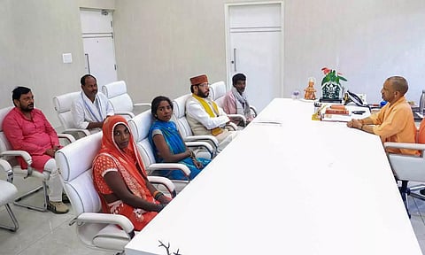 Uttar Pradesh Chief Minister Yogi Adityanath meets family members of the person who was killed in Amethi (PTI)