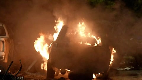 A Vehicle on fire after the explosion (AP)