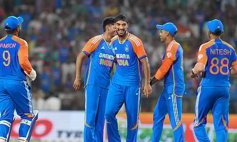Indian players celebrate after picking a wicket (PTI)