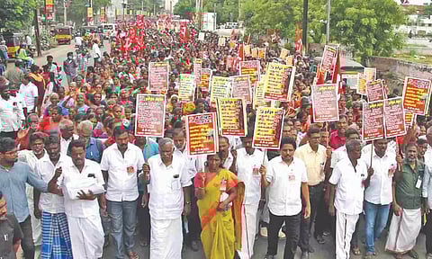 CPM cadre taking out a rally pressing their demand in Madurai on Monday