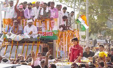 Congress candidate Vinesh Phogat greets supporters during her victory celebration after winning from Julana constituency in the Haryana Assembly elections (PTI)