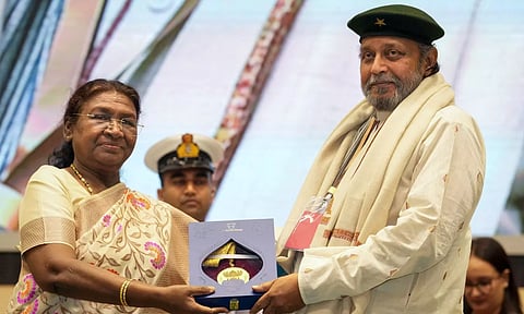 Veteran actor Mithun Chakraborty addresses the gathering after being conferred the Dadasaheb Phalke Award during the 70th National Film Awards (PTI)