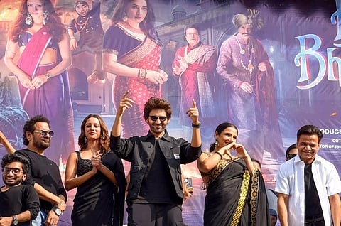 Actors Tripti Dimri, Vidya Balan and Kartik Aaryan during the trailer launch of their upcoming movie Bhool Bhulaiyaa 3