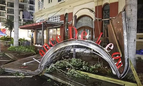 The Ponce De Leon Hotel sign fell to the ground after Hurricane Milton made landfall in Florida (AP)