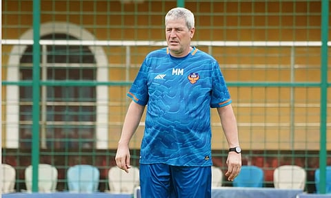 Head coach Manolo Marquez