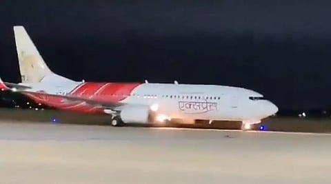 The Air India Express plane that safely landed following a snag, at the Tiruchy airport, on October 11, 2024. (Video screengrab)