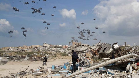 Humanitarian aid is airdropped to Palestinians over Gaza City (AP)