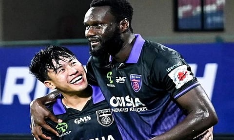 Odisha FC players celebrating after scoring a goal