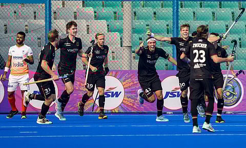 Germany's Henrik Mertgens (30) celebrates a goal with teammates during the first men's hockey match of a two-match series between India and Germany (PTI)