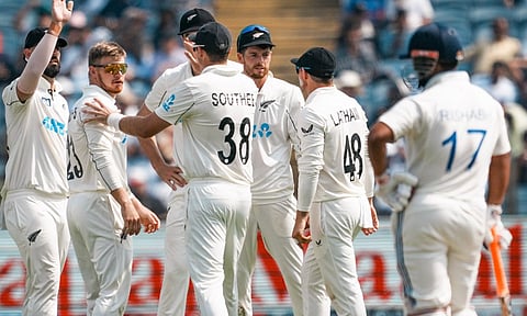 New Zealand players celebrate after getting a wicket (PTI)