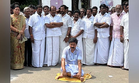 Former AIADMK minister C Ve Shanmugam resorted to a sit-in protest in front of the Villupuram Collectorate