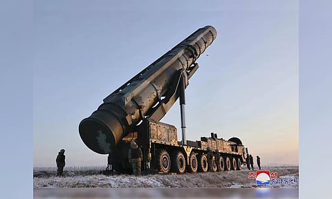 An undated photo by the North Korean government shows what it says is an intercontinental ballistic missile (ICBM) being prepared to launch