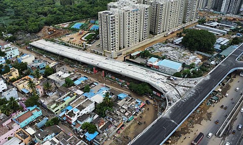 Aerial view of the under-construction arm of the road over bridge at Perungalathur