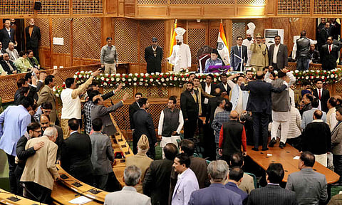 &nbsp;BJP legislators hold a protest after the Assembly passed a resolution on Article 370 restoration by voice vote (PTI)