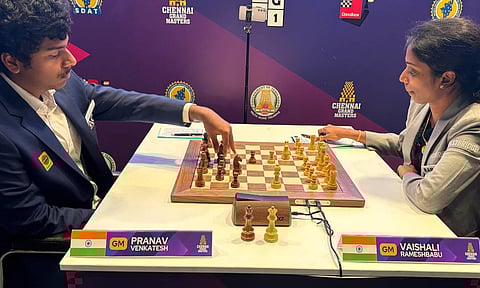 Pranav (L) makes a move against Vaishali (R) in the fourth round of Chennai Grand Masters&nbsp;