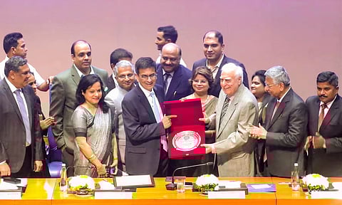 Outgoing Chief Justice of India (CJI) D.Y. Chandrachud being presented a memento by senior lawyer Kapil Sibal and others during a farewell function organised in his honour by Supreme Court Bar Association (SCBA) (PTI)