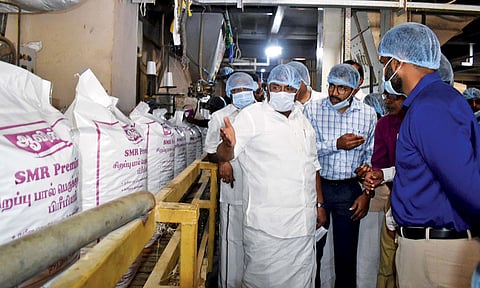 Minister for Milk and Dairy Development RS Rajakannappan inspecting the cattle feed plant in Erode.